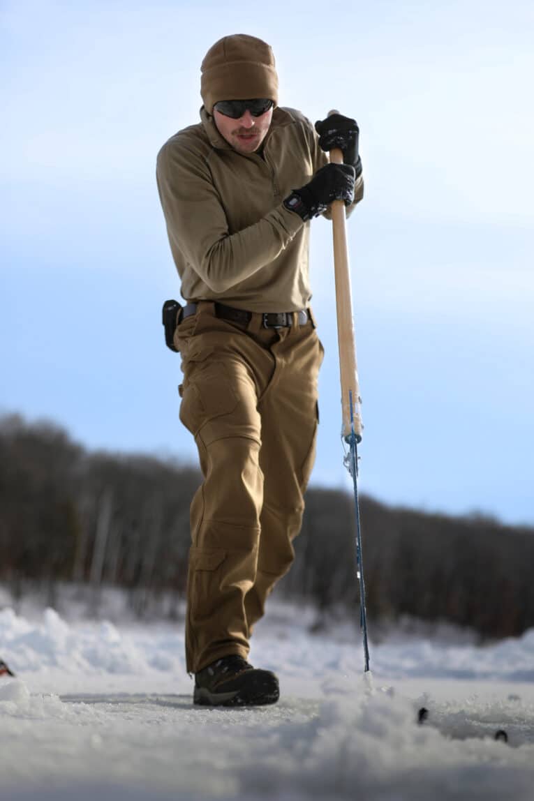 Navy Diver wearing G-Shock DW6900 while doing snow diving exercise