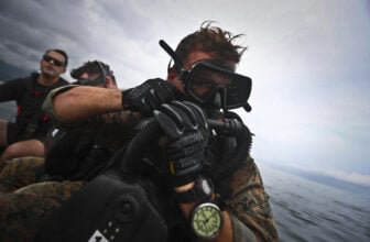 Reconnaissance Marine diver wearing G-Shock Dw-6900 during scuba diving operations in Hawaii
