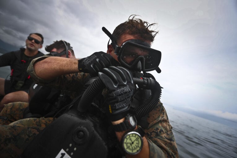 Reconnaissance Marine diver wearing G-Shock DW6900 during scuba diving operations in Hawaii
