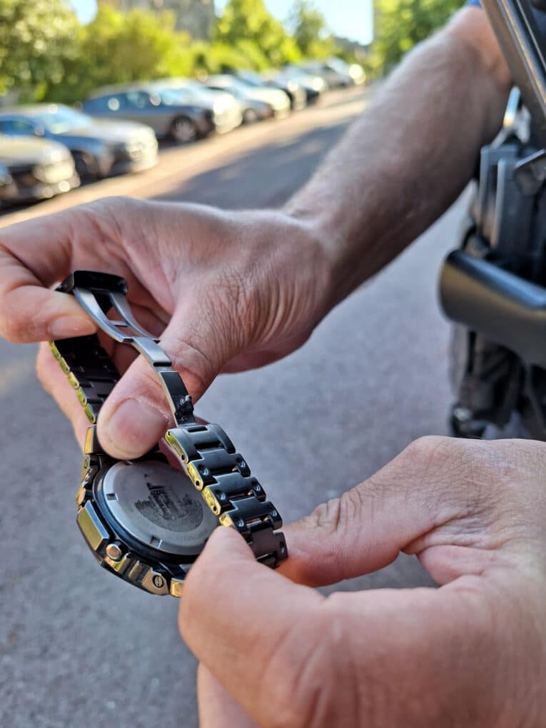 UK Royal Protection Officer wearing G-Shock GM-B2100 with custom case back engraving