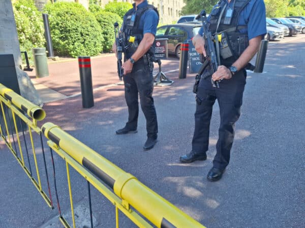 Royal Protection Officers U.K. Royal Protection officers wearing customized G-Shock GM-B2100 ...