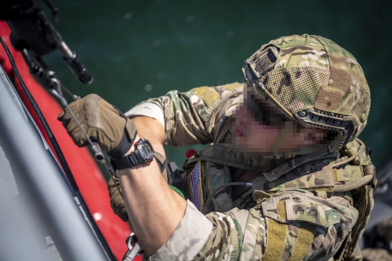 Navy SEAL wearing G-Shock Mudman G9000 during vessel seizure training
