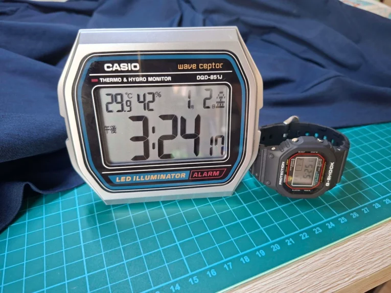 Casio DQD-851J-8JF next to G-Shock DW-5000R