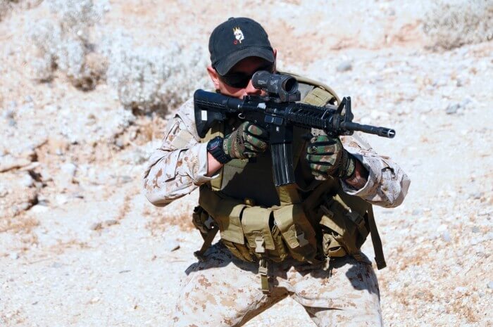 Navy SEAL wearing a G-Shock watch during desert training