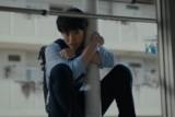 Eiji Akaso wears a G-Shock GA-2100 watch in ‘Zom 100: Bucket List of the Dead’