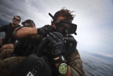 U.S. military (Navy and Marine) divers and soldiers wearing G-Shock watches on duty