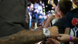 UFC fighter Max Holloway wears an iced out G-Shock GM2100 at the National Sports Collectors Convention