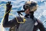 Navy SEAL divers wearing G-Shock watches in 2025