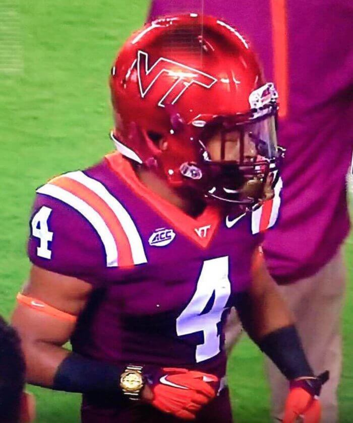 Virginia Tech J.C. Coleman wearing gold G-Shock during football game